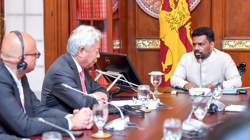 Sri Lanka President Anura Kumara Dissanayake and AIIB President Jin Liqun in discussion with officials at the Presidential Secretariat in Colombo