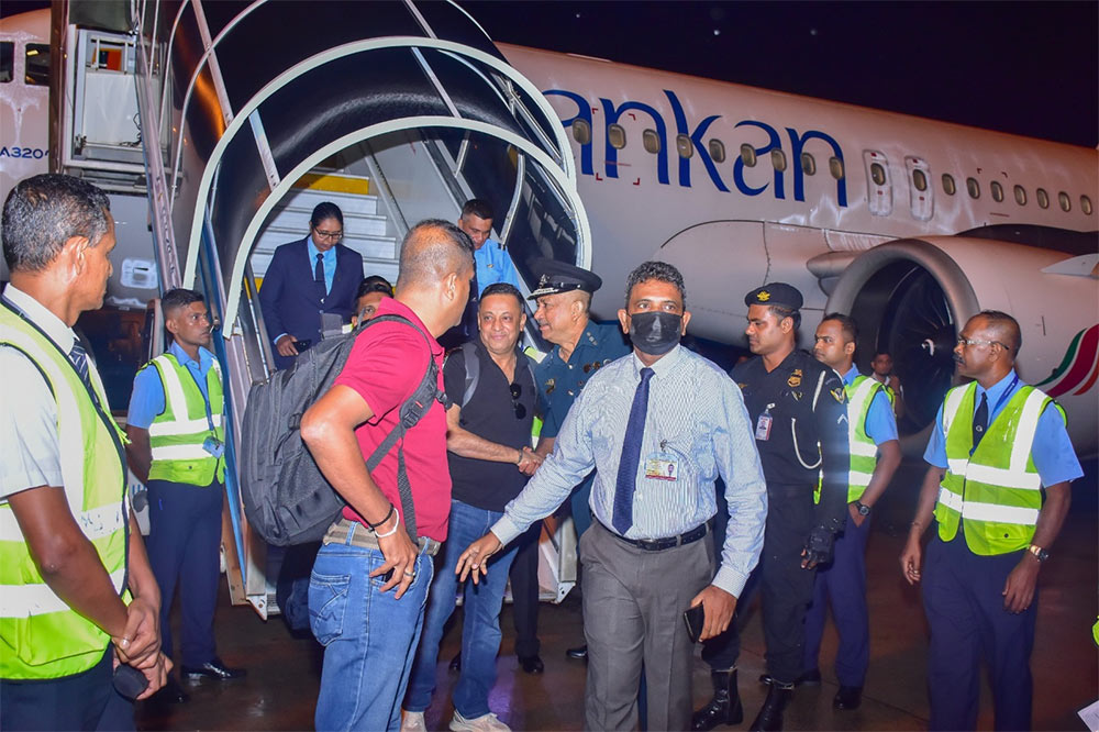 ASP Rohan Olugala stepping out of the plane after Ishara Sewwandi, who was brought back to Sri Lanka from Nepal.
