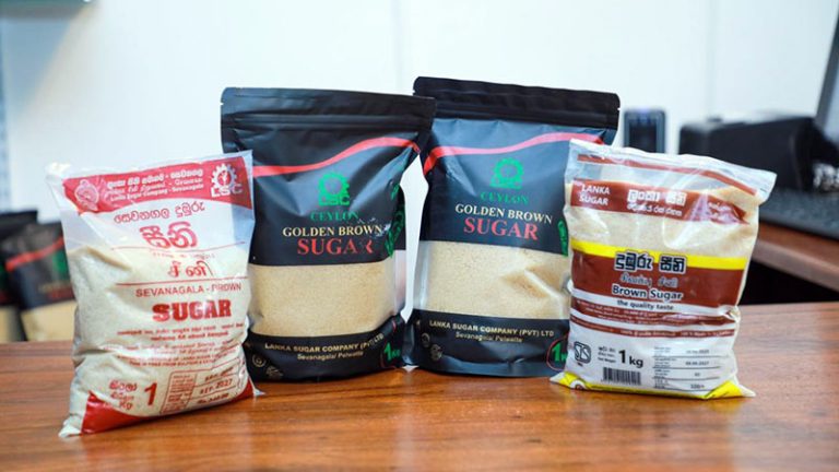Packaged brown sugar products displayed at the launch of Lanka Sugar Company sales network in Nugegoda, Sri Lanka