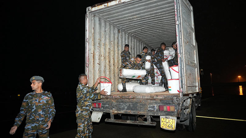 Indian Air Force C130 aircraft with relief items being unloaded in Sri Lanka