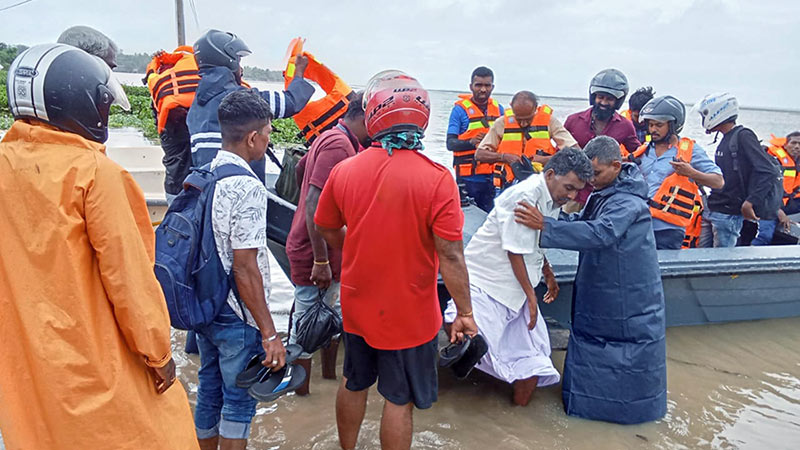 Sri Lanka Navy rescuing people during flood operations