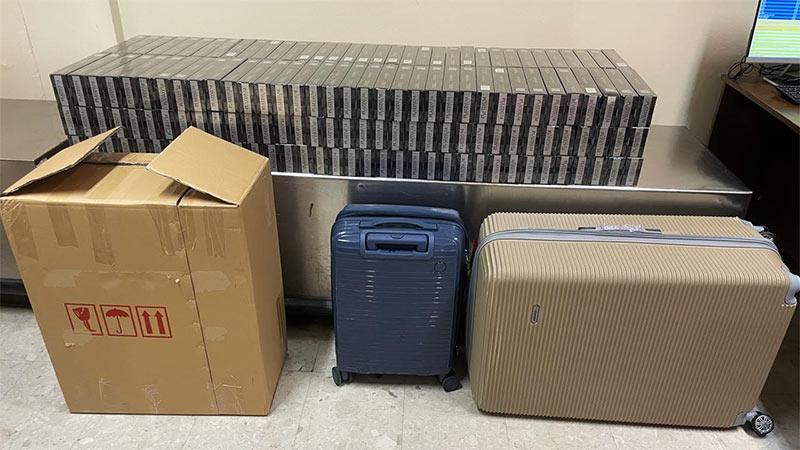 42,000 illegal cigarettes displayed after being seized from a suspect