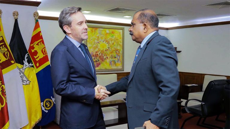 UN Resident Coordinator Marc-André Franche shakes hands with Sri Lanka’s Deputy Minister of Defence, Major General Aruna Jayasekara (Retd)