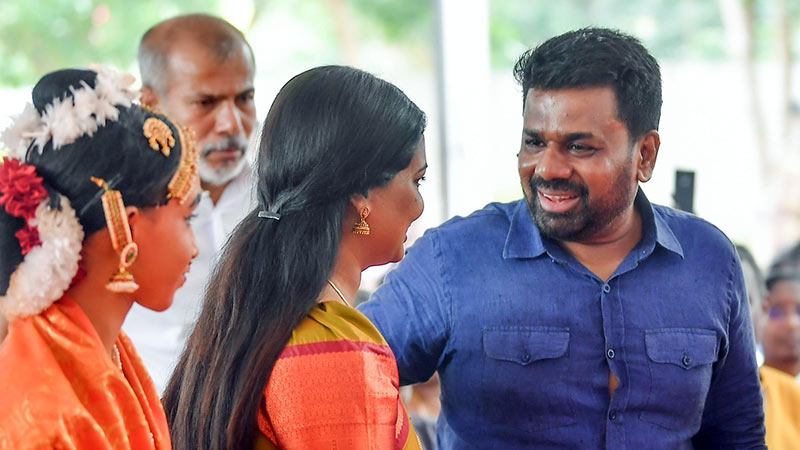 Sri Lanka President Anura Kumara Dissanayake greets the public after his speech at the National Housing Programme launch in Jaffna