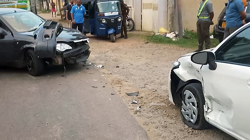 Damaged vehicles involved in road accident injuring MP Asoka Ranwala’s wife