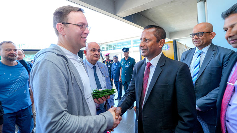 Sri Lankan officials welcome Russian Deputy Energy Minister Roman Marshavin at Bandaranaike International Airport in Katunayake