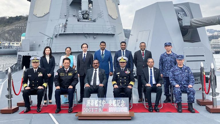 Sri Lanka and Japan defence officials pose for a group photo aboard JS Maya during the defence delegation visit in Tokyo