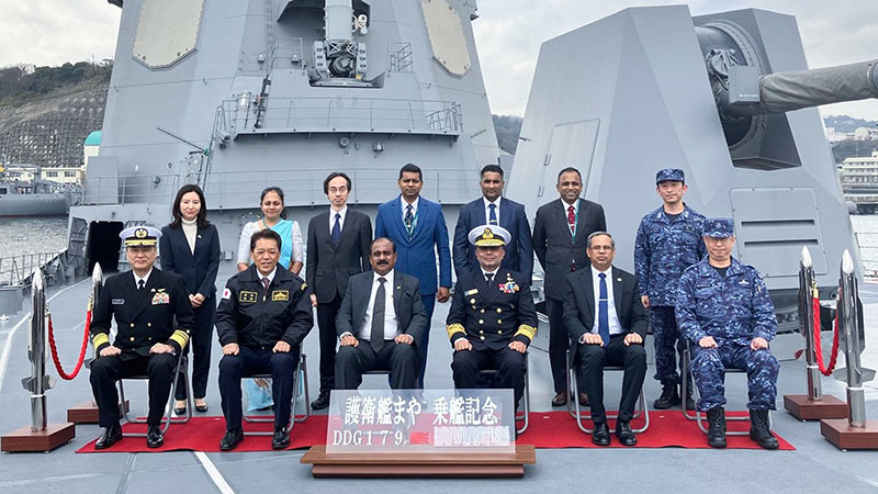 Sri Lanka and Japan defence officials pose for a group photo aboard JS Maya during the defence delegation visit in Tokyo