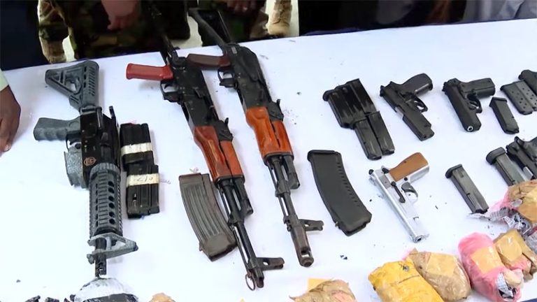 Weapons including T-56 rifles, pistols and an M16 recovered from narcotics trawler seized by Sri Lanka Navy off the Southern coast