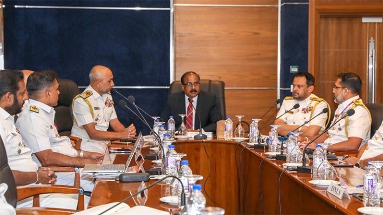 Deputy Minister of Defence Major General Aruna Jayasekara (Retd) meets Sri Lanka Navy officials during a 'Ratama Ekata' anti-drug review in Akuregoda