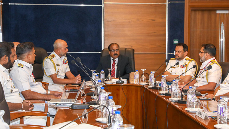 Deputy Minister of Defence Major General Aruna Jayasekara (Retd) meets Sri Lanka Navy officials during a 'Ratama Ekata' anti-drug review in Akuregoda