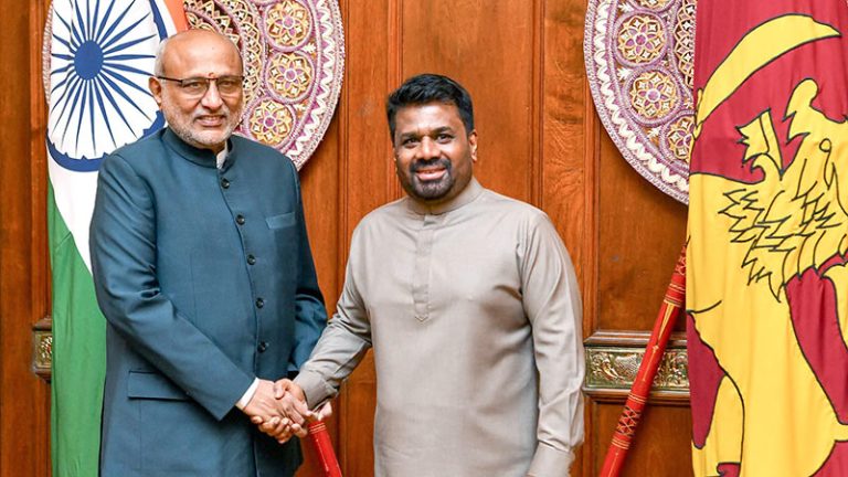 Indian Vice-President C. P. Radhakrishnan shakes hands with Sri Lankan President Anura Kumara Dissanayake in Colombo