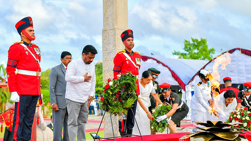 Sri Lanka President Anura Kumara Dissanayake bows his head at the National War Heroes Memorial in Sri Jayawardenepura, Kotte