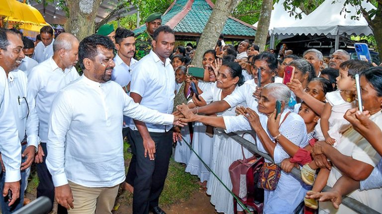 Sri Lanka President Anura Kumara Dissanayake greets devotees during the Vaishakya Festival 2026 at Ganewewa Purana Viharaya in Nikaweratiya