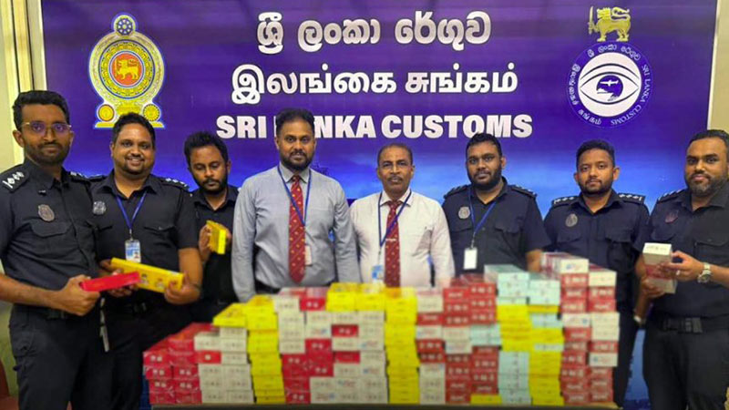 Chinese Passengers arrested at Bandaranaike International Airport in Katunayake with Rs. 6 Million cigarette haul