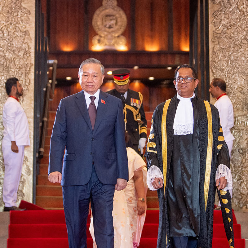 Sri Lanka Speaker Dr. Jagath Wickramaratne and Vietnamese President To Lam walk together at the Parliament of Sri Lanka