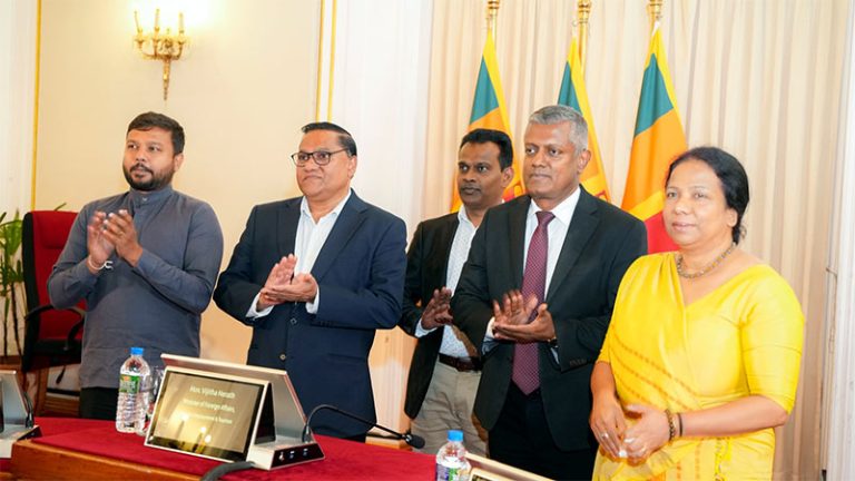 Minister Vijitha Herath and officials applaud during the launch of Sri Lanka’s revamped Foreign Affairs Ministry website and Common Website Platform for overseas missions