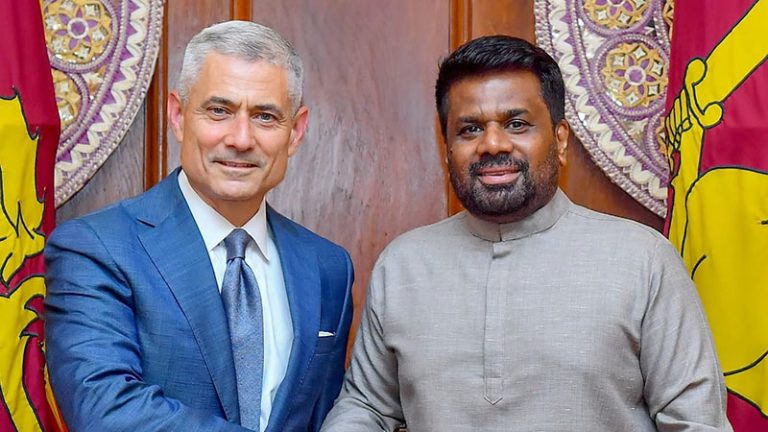 Sri Lanka President Anura Kumara Dissanayake shakes hands with U.S. Assistant Secretary of State for South and Central Asian Affairs Paul Kapur during a meeting at the Presidential Secretariat in Colombo on June 22, 2026