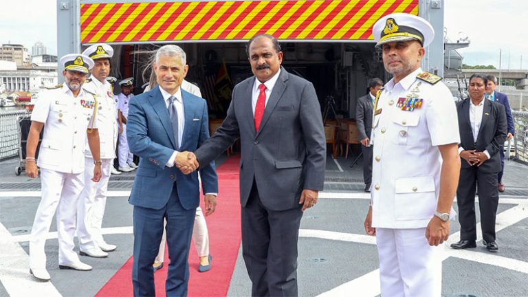 Deputy Defence Minister Aruna Jayasekara and U.S. Assistant Secretary of State Dr. S. Paul Kapur shake hands aboard SLNS Gajabahu during the announcement of a USD 4 million satellite communication system for the Sri Lanka Navy at the Port of Colombo on June 22, 2026