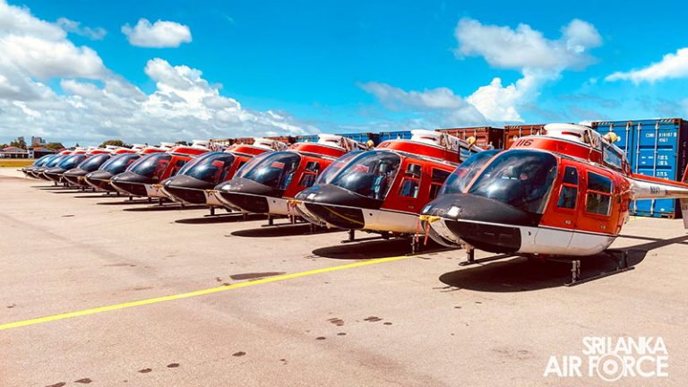 TH-57 Sea Ranger helicopters donated by the United States lined up after arriving in Sri Lanka