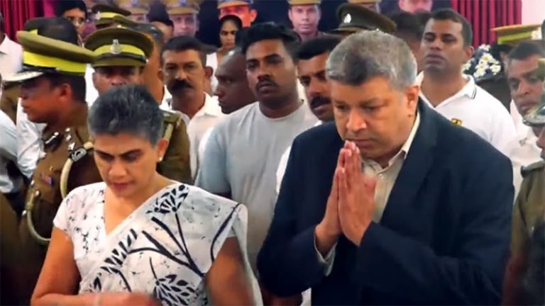 Justice Minister Harshana Nanayakkara pays final respects to prison officers at Welikada Prison