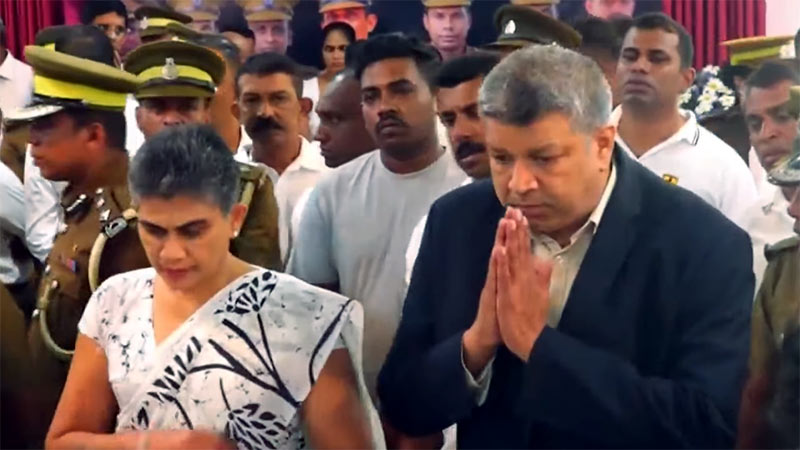 Justice Minister Harshana Nanayakkara pays final respects to prison officers at Welikada Prison