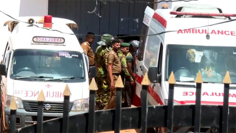 STF personnel and ambulance at Negombo Prison during security operation