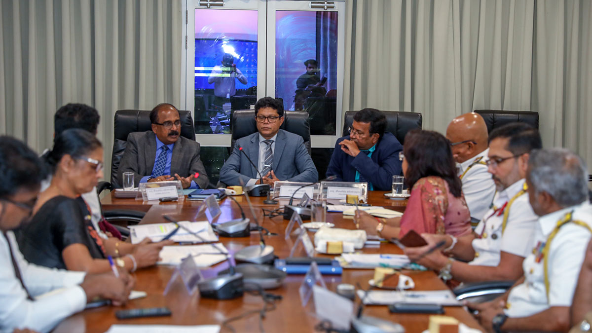 Sri Lanka officials discuss marine and coastal protection and security at fishery harbours during a progress review meeting