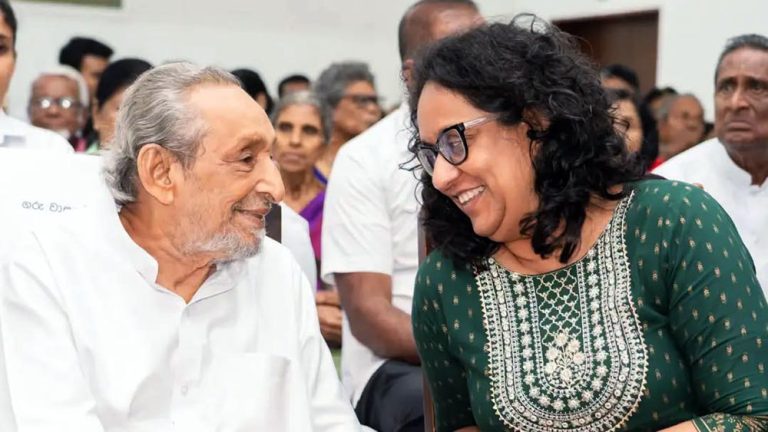 Vasudeva Nanayakkara and Prime Minister Harini Amarasuriya in discussion at the 'Rathuwevi Mihimadala' book launch in Colombo