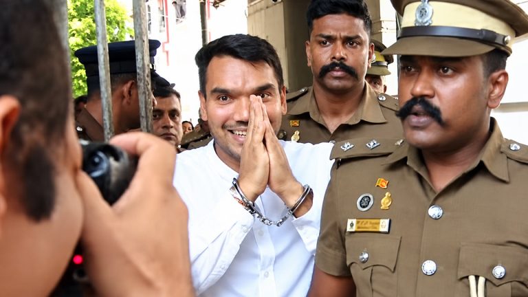 Namal Rajapaksa leaving the Colombo Chief Magistrate’s Court in handcuffs on September 29, 2026
