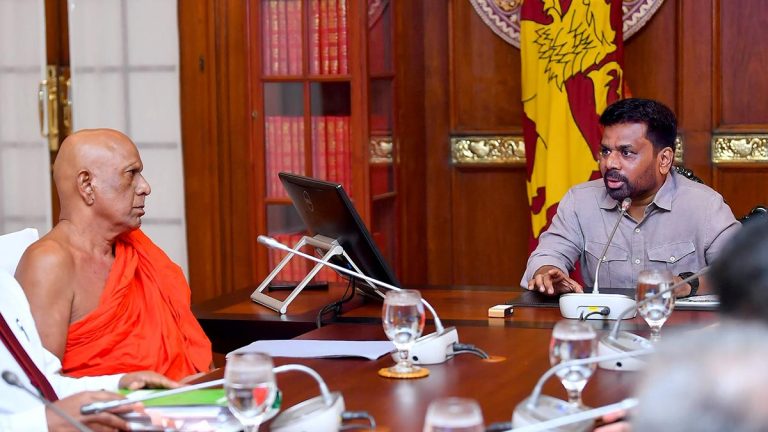 President Anura Kumara Dissanayake speaking with Most Venerable Thanthirimale Chandarathana Thera during the Lower Malwathu Oya project discussion