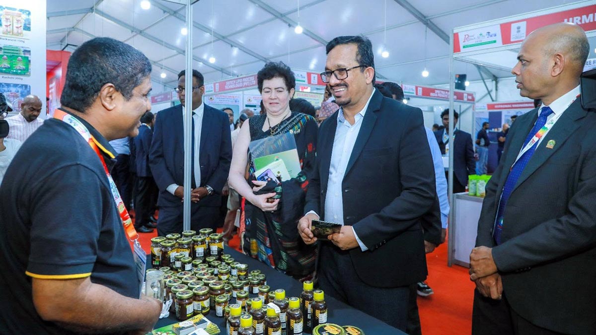 Minister Sunil Handunnetti and Ministry Secretary Thilaka Jayasundara visit a food stall at Pro Food – Pro Pack – Ag Biz and Knowledge Hub 2026 in Colombo