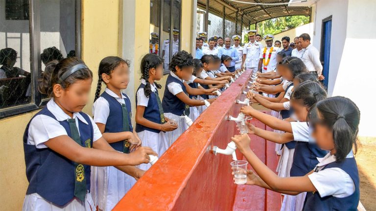 Schoolchildren use the newly built drinking water facility at Muttur Muslim Girls’ College in Trincomalee