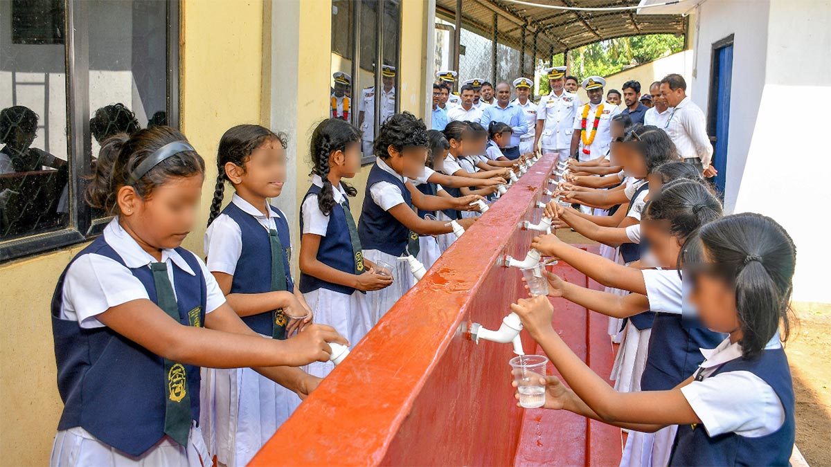 Schoolchildren use the newly built drinking water facility at Muttur Muslim Girls’ College in Trincomalee