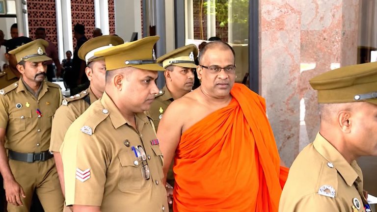 Venerable Galagoda Aththe Gnanasara Thera escorted by prison officers from court premises