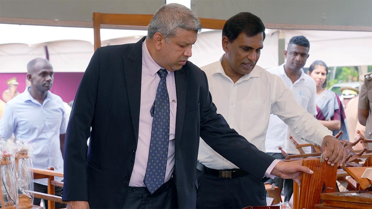 Sri Lanka’s Justice Minister Harshana Nanayakkara and Public Security Minister Ananda Wijepala inspect products made by prison inmates at the Sirasara Shilpa 2026 exhibition