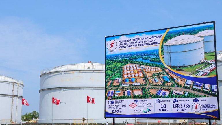 Project board and existing fuel storage tanks at the Muthurajawela Terminal in Sri Lanka