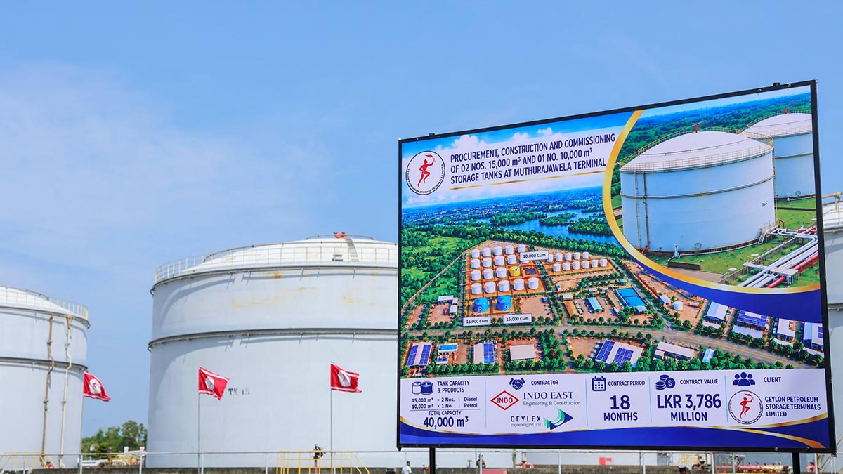 Project board and existing fuel storage tanks at the Muthurajawela Terminal in Sri Lanka
